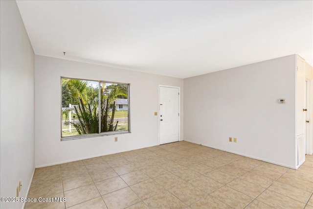933 Gueld Ave NE, Palm Bay, FL 32905 - unfurnished room with light tile patterned floors