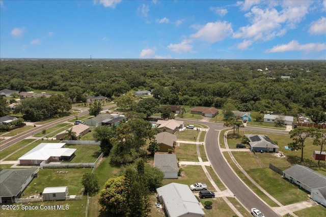 933 Gueld Ave NE, Palm Bay, FL 32905 - aerial view of residential area with a forest