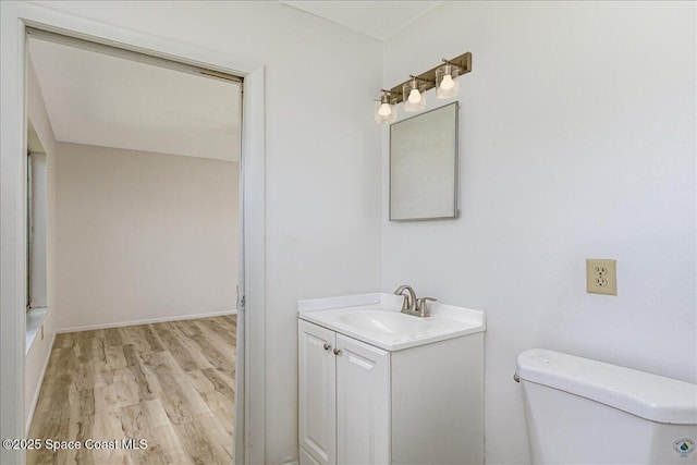 933 Gueld Ave NE, Palm Bay, FL 32905 - bathroom with wood finished floors and vanity