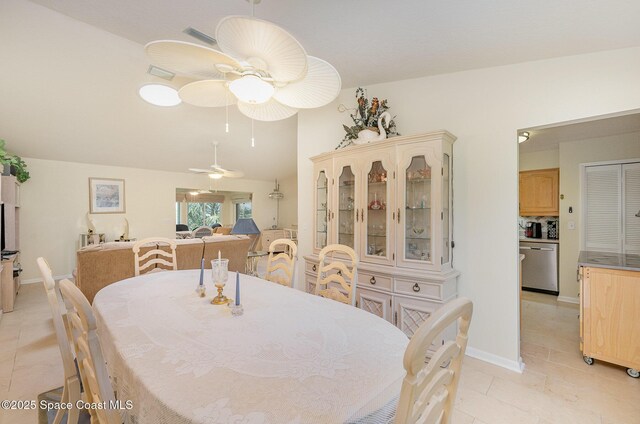 960 Mayflower Ave, Melbourne, FL 32940 - dining area featuring a ceiling fan, light tile patterned floors, and baseboards