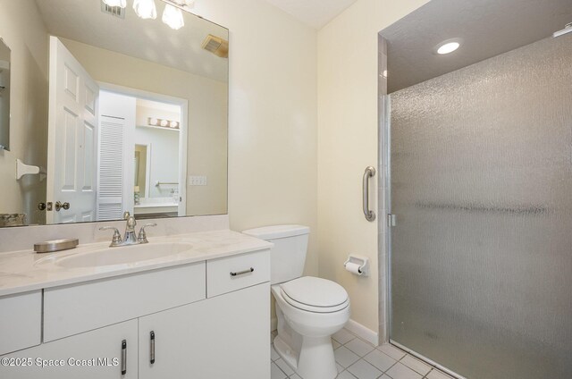 960 Mayflower Ave, Melbourne, FL 32940 - full bath featuring vanity, tile patterned flooring, a shower stall, toilet, and recessed lighting