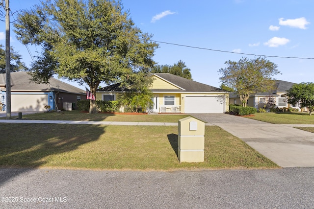 2922 Brandywine Cir, Titusville, FL 32796 - ranch-style house featuring driveway, an attached garage, and a front yard