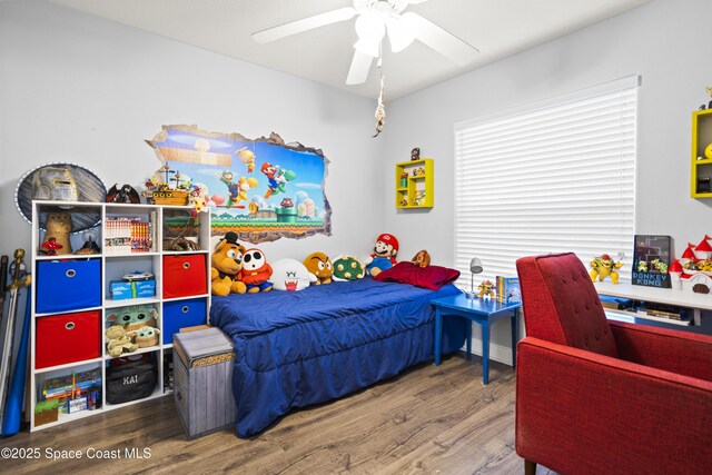 2922 Brandywine Cir, Titusville, FL 32796 - bedroom featuring wood finished floors and ceiling fan