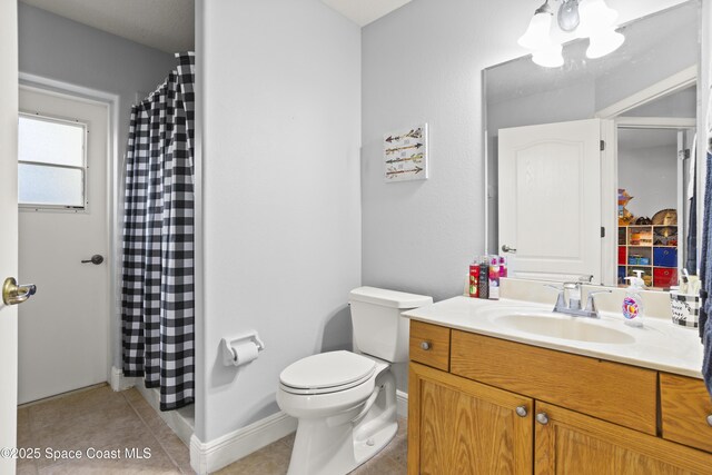 2922 Brandywine Cir, Titusville, FL 32796 - full bathroom featuring vanity, tile patterned floors, toilet, and curtained shower