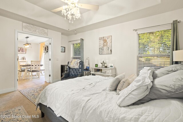 2922 Brandywine Cir, Titusville, FL 32796 - bedroom with baseboards, carpet, and a ceiling fan