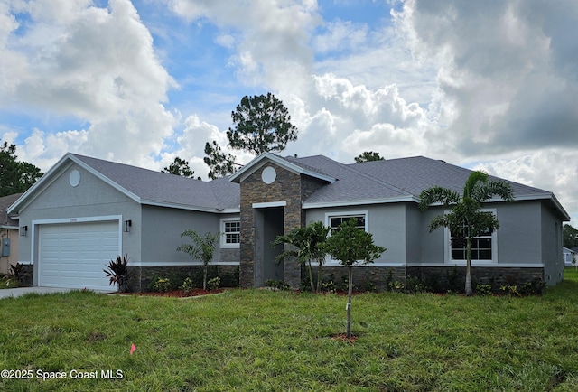 2999 Gaffney Ave SE, Palm Bay, FL 32909 - ranch-style house with stone siding, an attached garage, and stucco siding