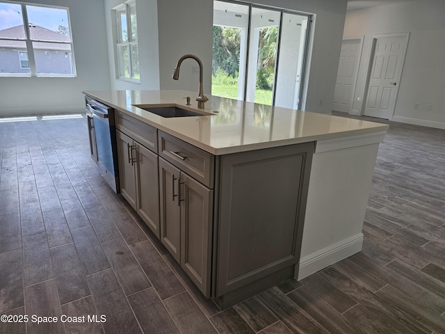 2999 Gaffney Ave SE, Palm Bay, FL 32909 - kitchen featuring dishwasher, dark wood-style flooring, gray cabinetry, and open floor plan