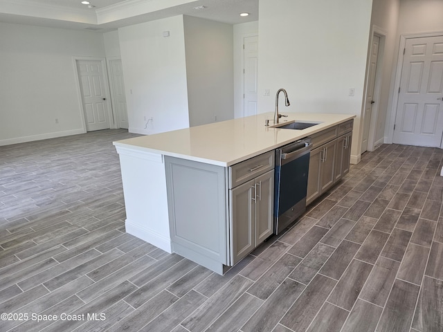 2999 Gaffney Ave SE, Palm Bay, FL 32909 - kitchen featuring stainless steel dishwasher, dark wood-style flooring, light countertops, an island with sink, and recessed lighting