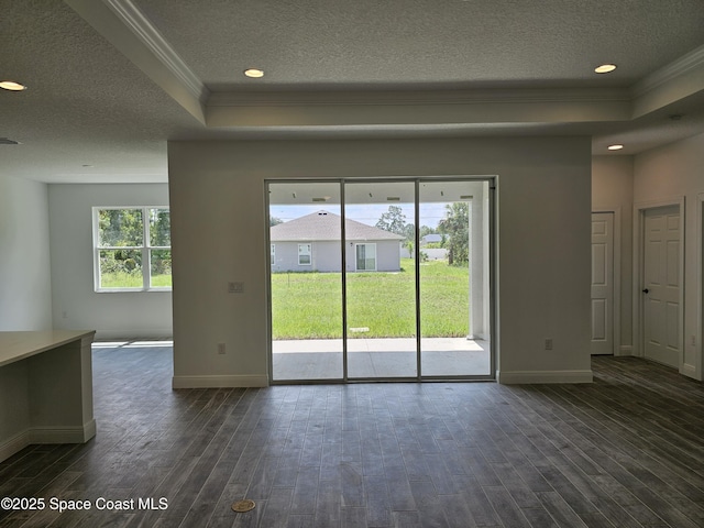 2999 Gaffney Ave SE, Palm Bay, FL 32909 - unfurnished room with ornamental molding, a textured ceiling, a raised ceiling, dark wood-style floors, and recessed lighting