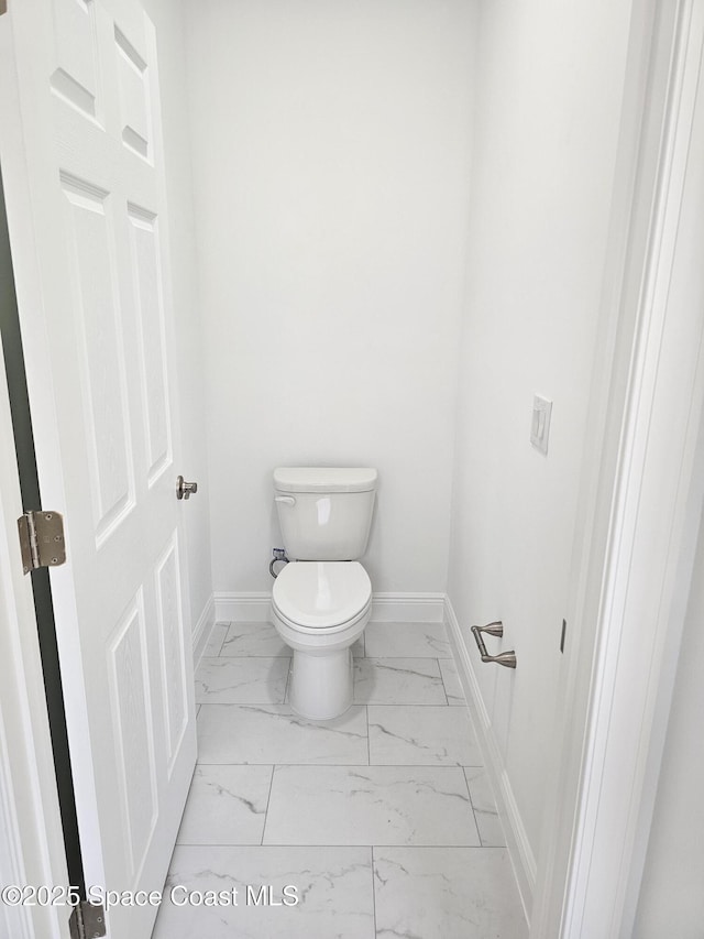 2999 Gaffney Ave SE, Palm Bay, FL 32909 - bathroom featuring marble finish floors and baseboards