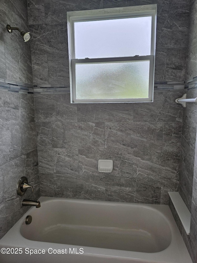 431 Falls Church St SW, Palm Bay, FL 32908 - full bathroom featuring healthy amount of natural light and bathing tub / shower combination