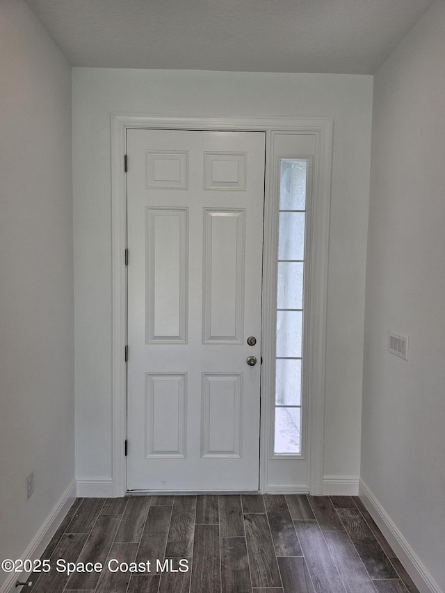 431 Falls Church St SW, Palm Bay, FL 32908 - entrance foyer featuring dark wood-style floors