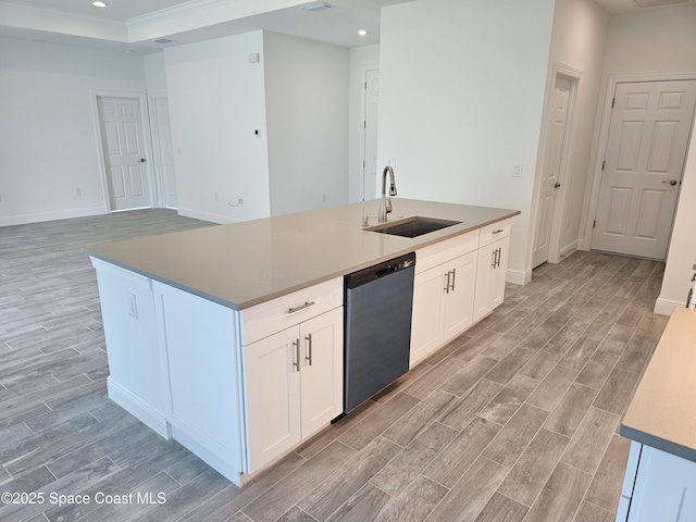 431 Falls Church St SW, Palm Bay, FL 32908 - kitchen with dishwasher, light wood-style floors, recessed lighting, white cabinetry, and an island with sink
