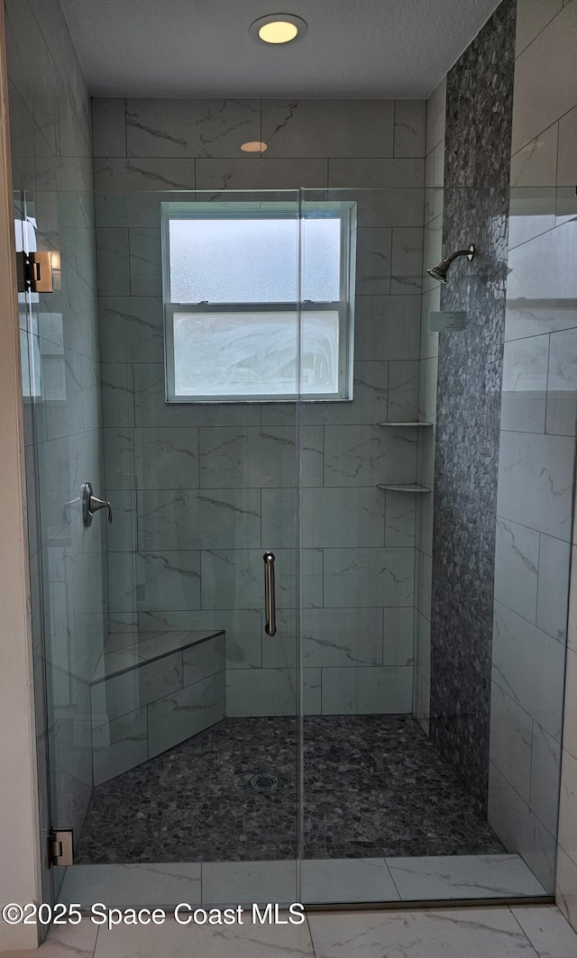 431 Falls Church St SW, Palm Bay, FL 32908 - full bathroom with a stall shower and healthy amount of natural light