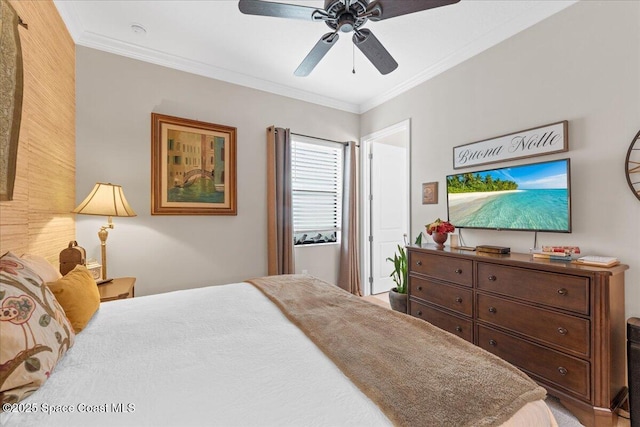 2889 Millennium Cir, Melbourne, FL 32940 - bedroom with ornamental molding and a ceiling fan