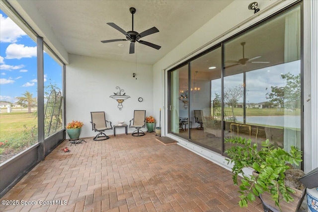 2889 Millennium Cir, Melbourne, FL 32940 - sunroom / solarium with ceiling fan and a water view