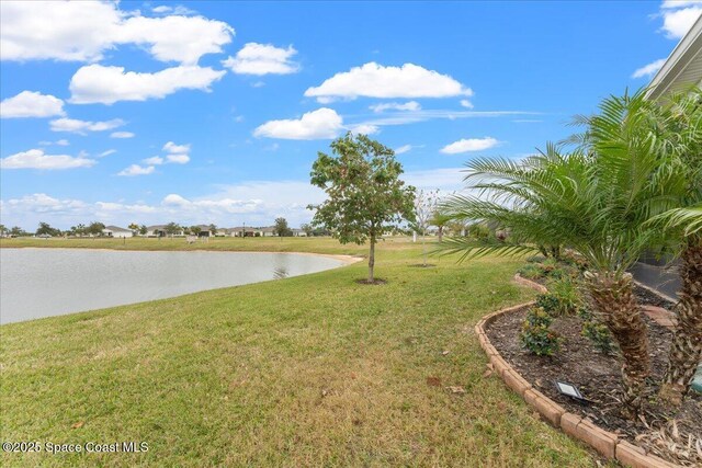2889 Millennium Cir, Melbourne, FL 32940 - view of grassy yard featuring a water view