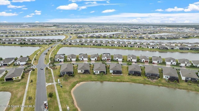 2889 Millennium Cir, Melbourne, FL 32940 - aerial view of property's location with nearby suburban area and a nearby body of water