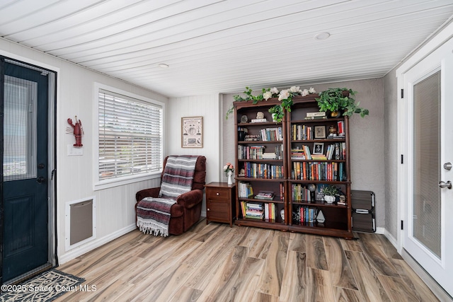 1035 Blau Ct NW, Palm Bay, FL 32907 - living area featuring wood finished floors and heating unit