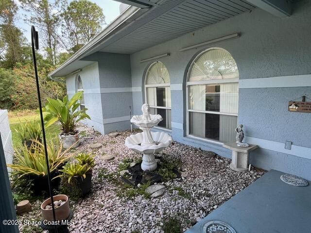 130 Nemo Cir NE, Palm Bay, FL 32907 - view of side of home