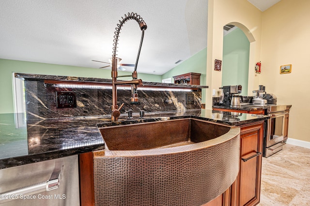 1317 Mohegan Ter SE, Palm Bay, FL 32909 - bar area featuring stainless steel range with electric stovetop