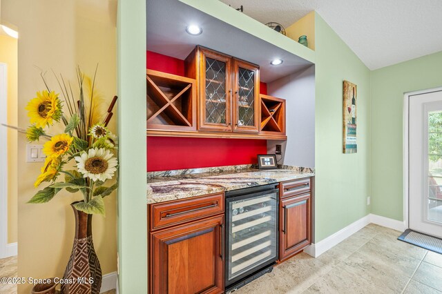 1317 Mohegan Ter SE, Palm Bay, FL 32909 - indoor bar featuring wine cooler, baseboards, and recessed lighting