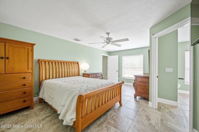1317 Mohegan Ter SE, Palm Bay, FL 32909 - bedroom featuring baseboards, ceiling fan, and a textured ceiling