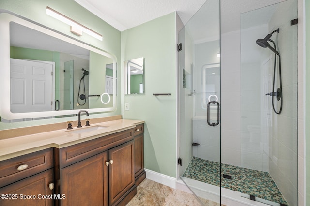 1317 Mohegan Ter SE, Palm Bay, FL 32909 - full bathroom with vanity, a shower stall, and baseboards