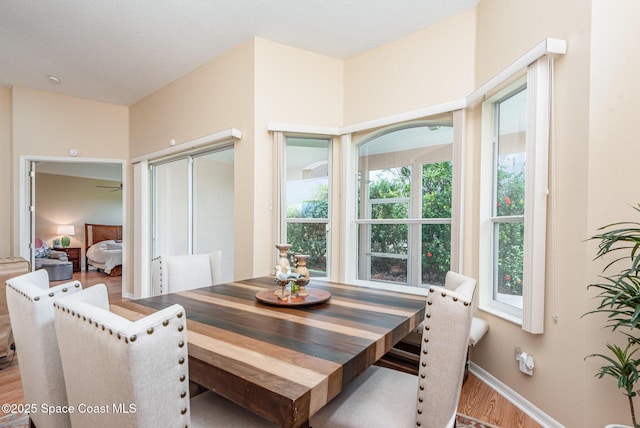 570 Shell Cove Dr, Melbourne, FL 32940 - dining room featuring wood finished floors and baseboards