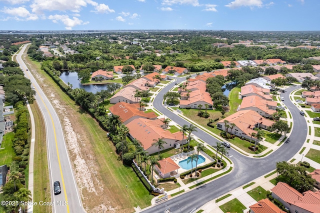 570 Shell Cove Dr, Melbourne, FL 32940 - aerial view of residential area featuring a large body of water and a pool