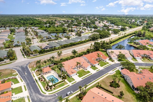 570 Shell Cove Dr, Melbourne, FL 32940 - aerial view of residential area featuring a large body of water and a pool