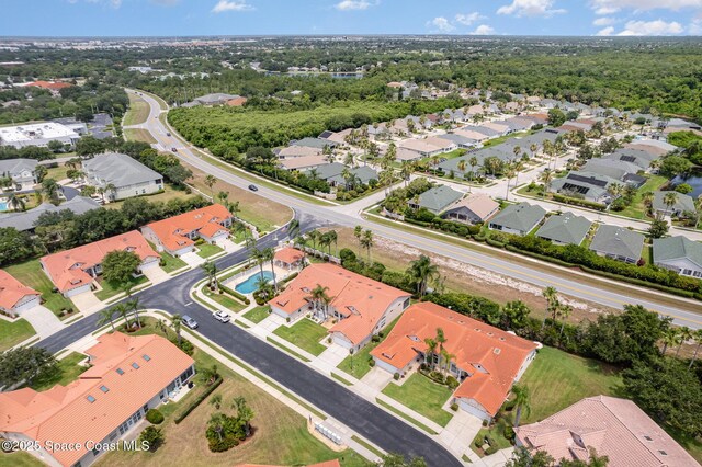 570 Shell Cove Dr, Melbourne, FL 32940 - aerial view of property and surrounding area with nearby suburban area