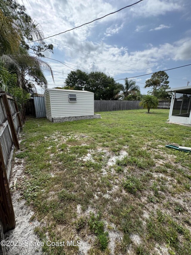 157 Lehigh Ave SE, Palm Bay, FL 32909 - view of yard with a sunroom