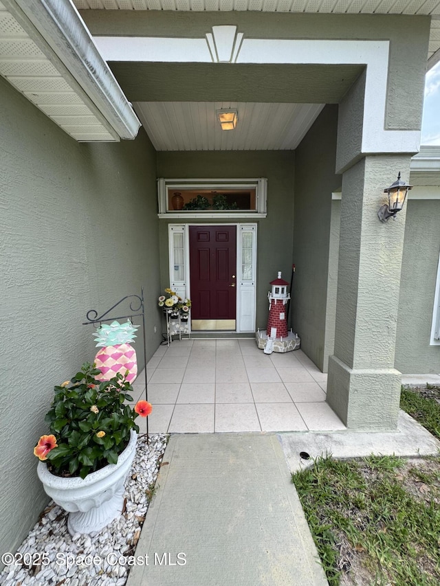 157 Lehigh Ave SE, Palm Bay, FL 32909 - doorway to property with stucco siding