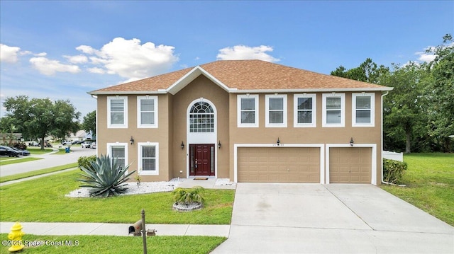 1500 La Maderia Dr SW, Palm Bay, FL 32908 - view of front of property with an attached garage, driveway, a front yard, and stucco siding