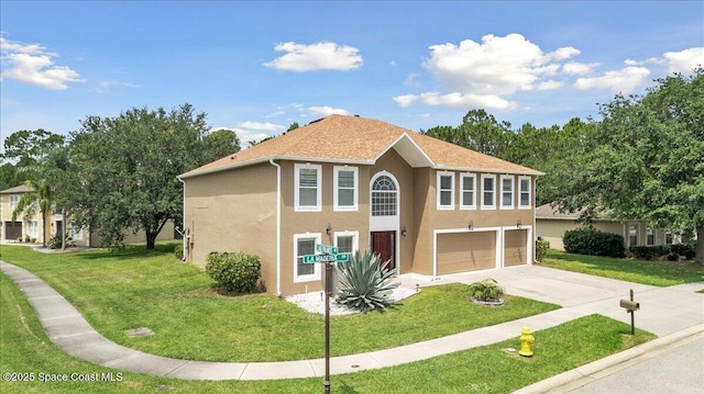 1500 La Maderia Dr SW, Palm Bay, FL 32908 - view of front facade with an attached garage, stucco siding, driveway, and a front yard