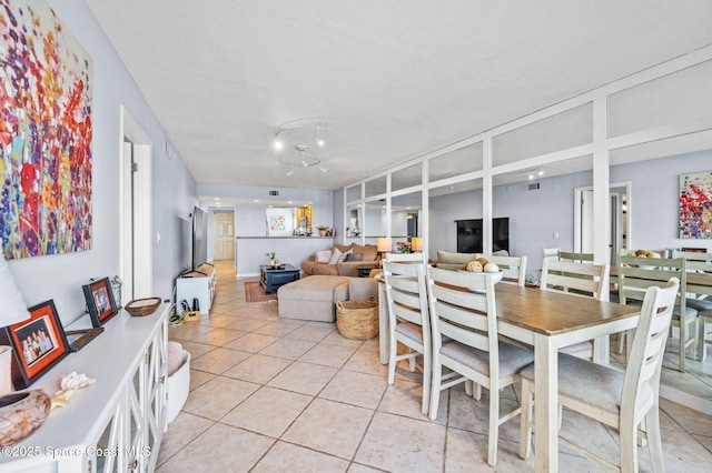 3901 Dixie Hwy NE Unit 301, Palm Bay, FL 32905 - dining space featuring light tile patterned floors
