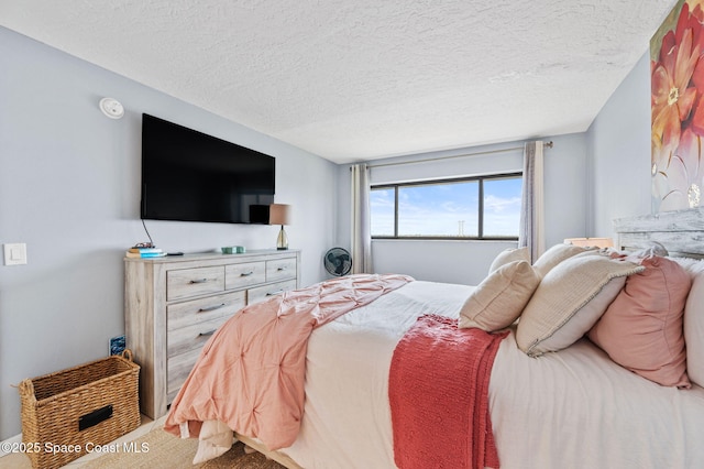 3901 Dixie Hwy NE Unit 301, Palm Bay, FL 32905 - carpeted bedroom with a textured ceiling