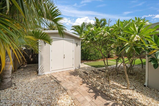 629 Verbenia Dr, Satellite Beach, FL 32937 - view of shed featuring a fenced backyard