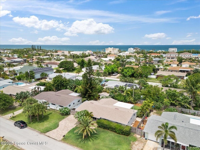 629 Verbenia Dr, Satellite Beach, FL 32937 - aerial perspective of suburban area featuring a large body of water