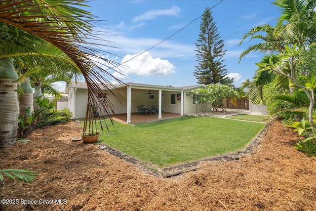 629 Verbenia Dr, Satellite Beach, FL 32937 - rear view of property with a ceiling fan, a patio, and stucco siding