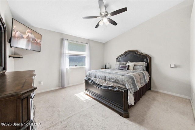 1911 Crane Creek Blvd, Melbourne, FL 32940 - carpeted bedroom featuring baseboards, lofted ceiling, and ceiling fan