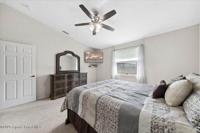 1911 Crane Creek Blvd, Melbourne, FL 32940 - bedroom featuring vaulted ceiling, light carpet, a ceiling fan, and baseboards