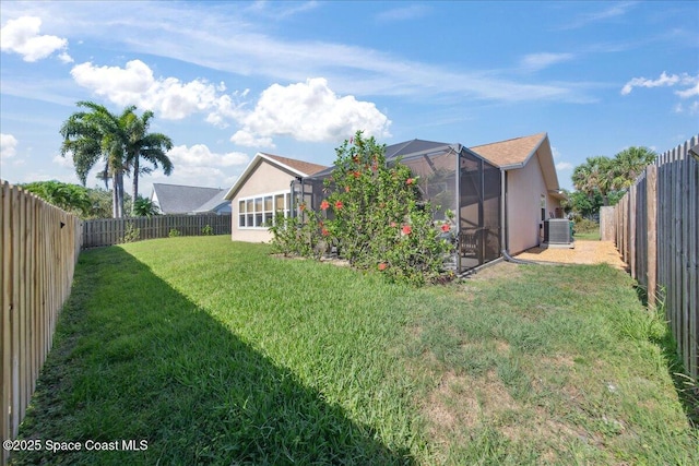 1911 Crane Creek Blvd, Melbourne, FL 32940 - view of yard featuring central air condition unit and a lanai