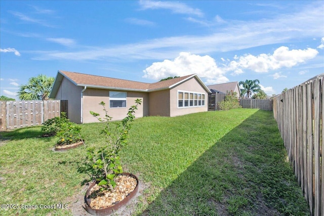 1911 Crane Creek Blvd, Melbourne, FL 32940 - rear view of house featuring stucco siding