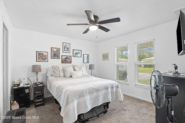 1456 Saxony Rd SW, Palm Bay, FL 32908 - carpeted bedroom featuring ceiling fan and a desk