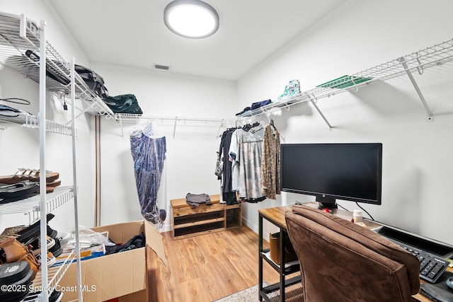 1685 Timacuan Dr, Melbourne, FL 32940 - walk in closet featuring wood finished floors