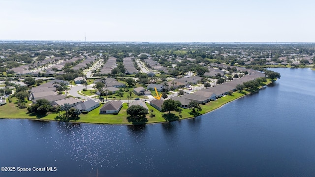 1685 Timacuan Dr, Melbourne, FL 32940 - aerial perspective of suburban area with a large body of water