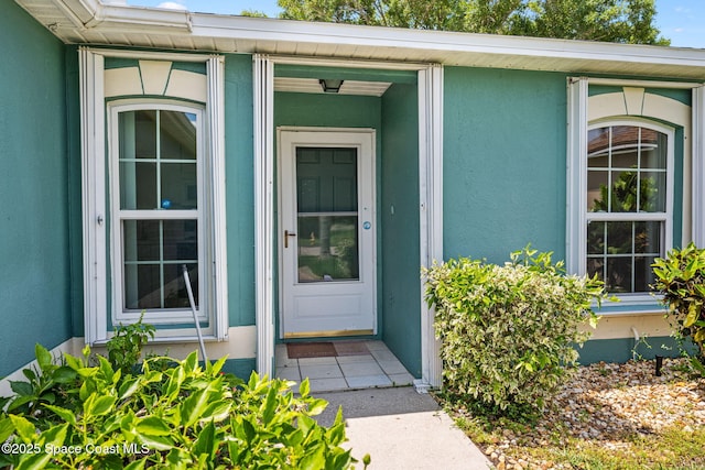 2719 Alicia Ln, Melbourne, FL 32935 - entrance to property featuring stucco siding