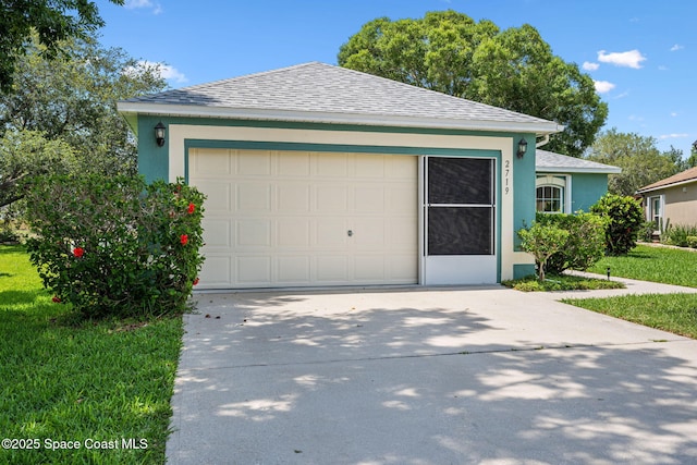 2719 Alicia Ln, Melbourne, FL 32935 - garage featuring concrete driveway